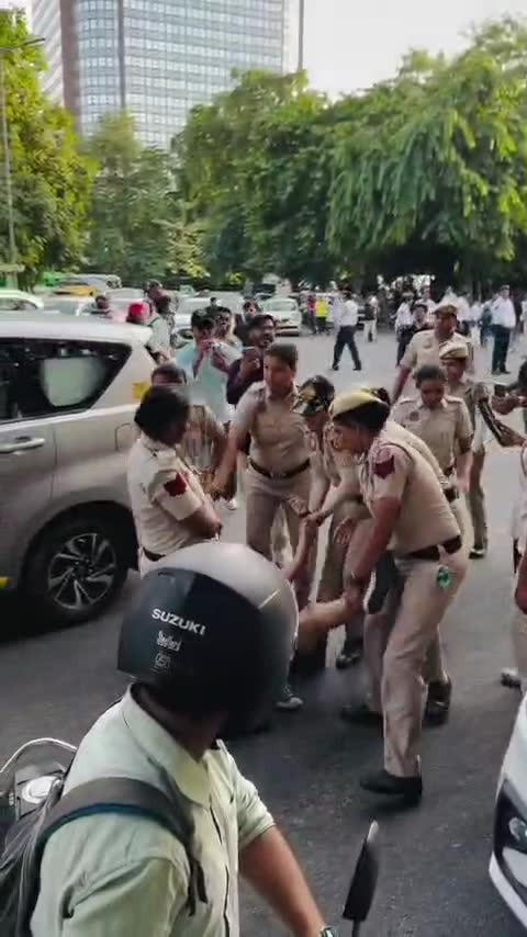 Police push elderly protesters
