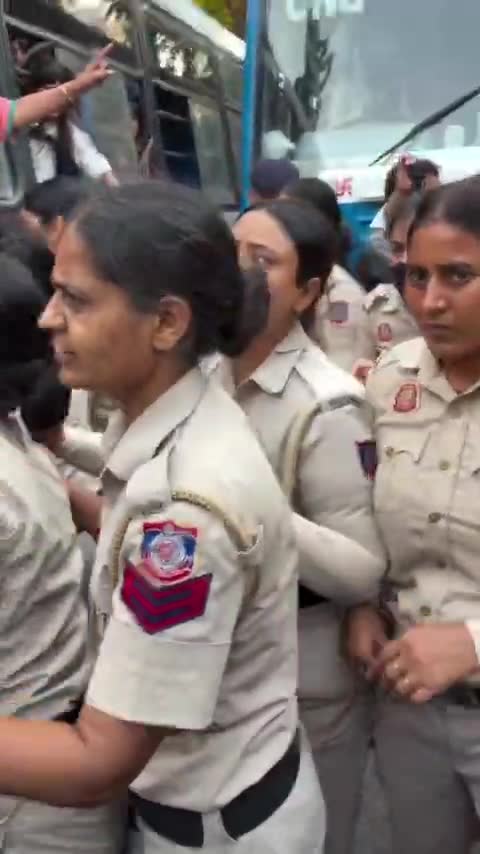Women forced into a police bus